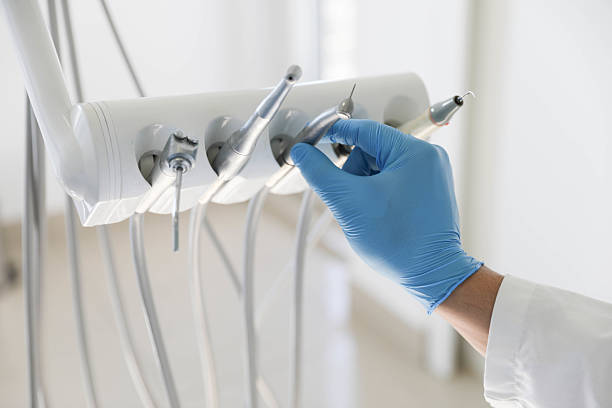 Professional Tooth Extraction technician working in New Orleans, LA